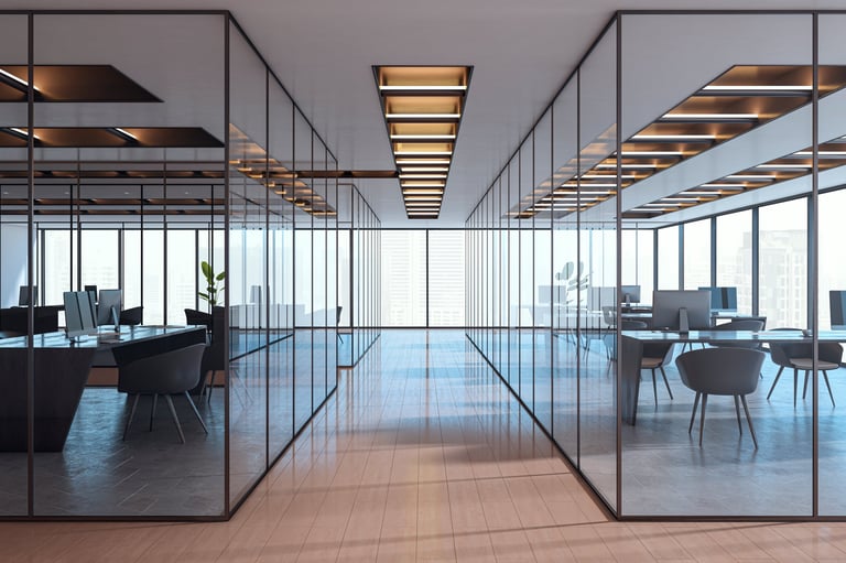 Contemporary empty office interior with glass partitions